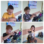 Dzieci wyciskają sok za pomocą wyciskarki