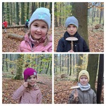 Uczniowie pozują do zdjęcia i obserwują las